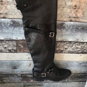 Tall black leather boots